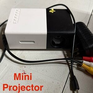 Compact Black and White Mini Projector